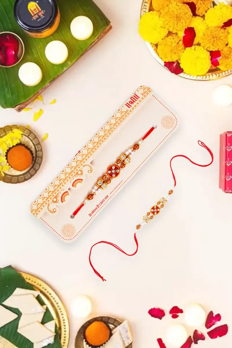 Elegant Designer Rakhi with Pearls and Golden Beads